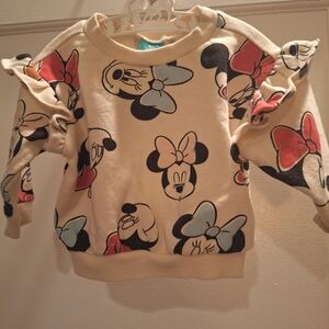 Disney Minnie Mouse cream sweatshirt has a cute ruffle on sleeve